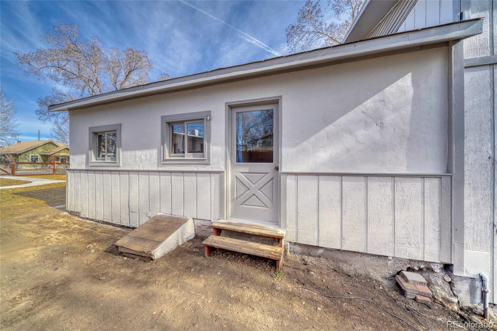 1335 F Street Salida, CO 81201 - Photo 3 of 44 a view of backyard with a wooden fence