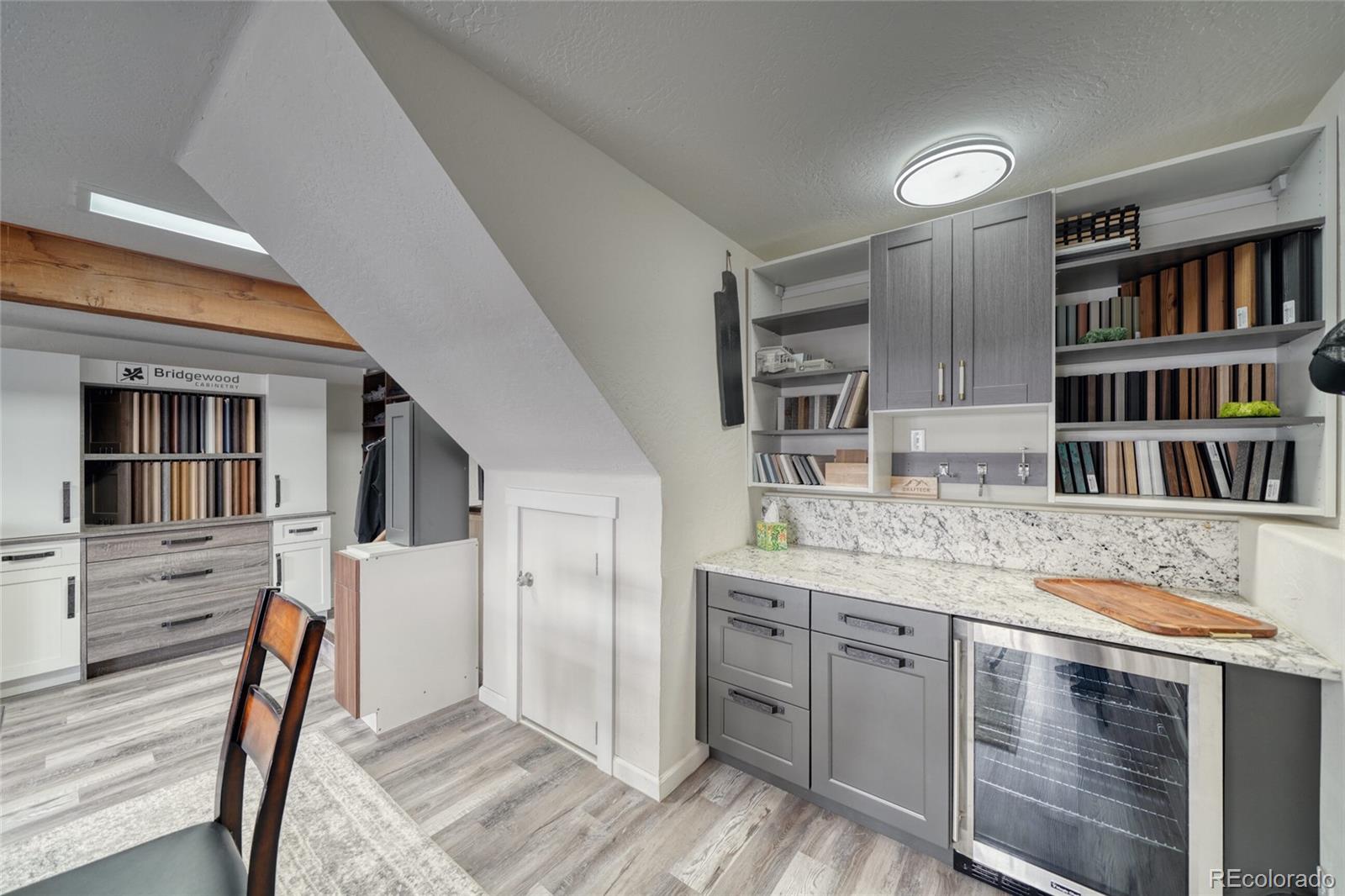 1335 F Street Salida, CO 81201 - Photo 32 of 44 a kitchen with stainless steel appliances granite countertop a refrigerator and a stove