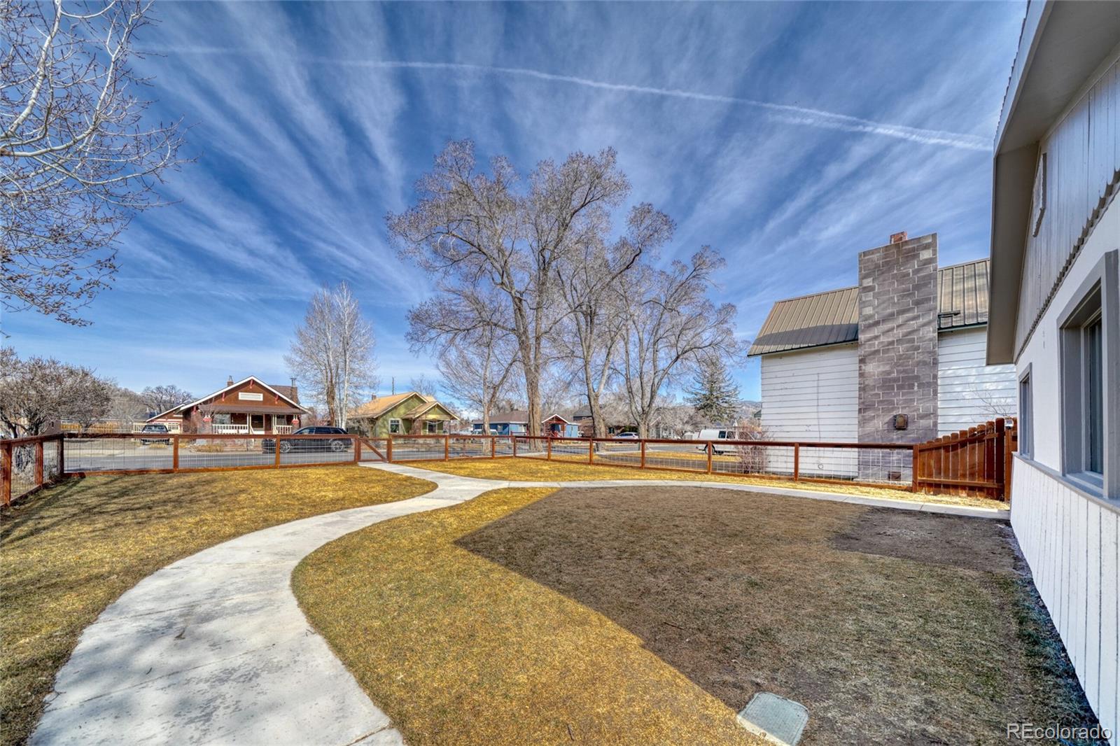 1335 F Street Salida, CO 81201 - Photo 38 of 44 a view of a swimming pool with an outdoor space and seating area
