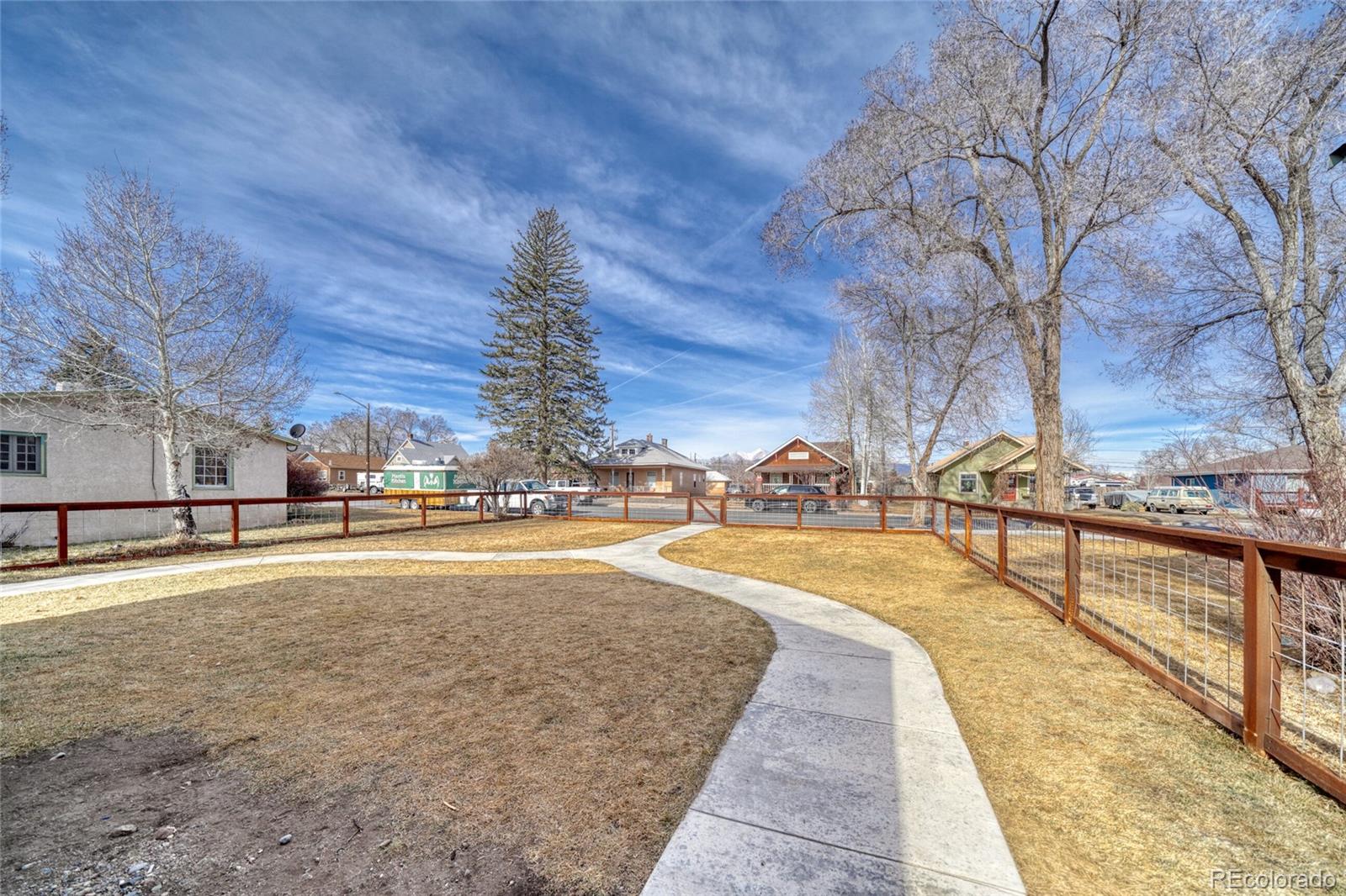 1335 F Street Salida, CO 81201 - Photo 39 of 44 a view of swimming pool with outdoor seating and a forest