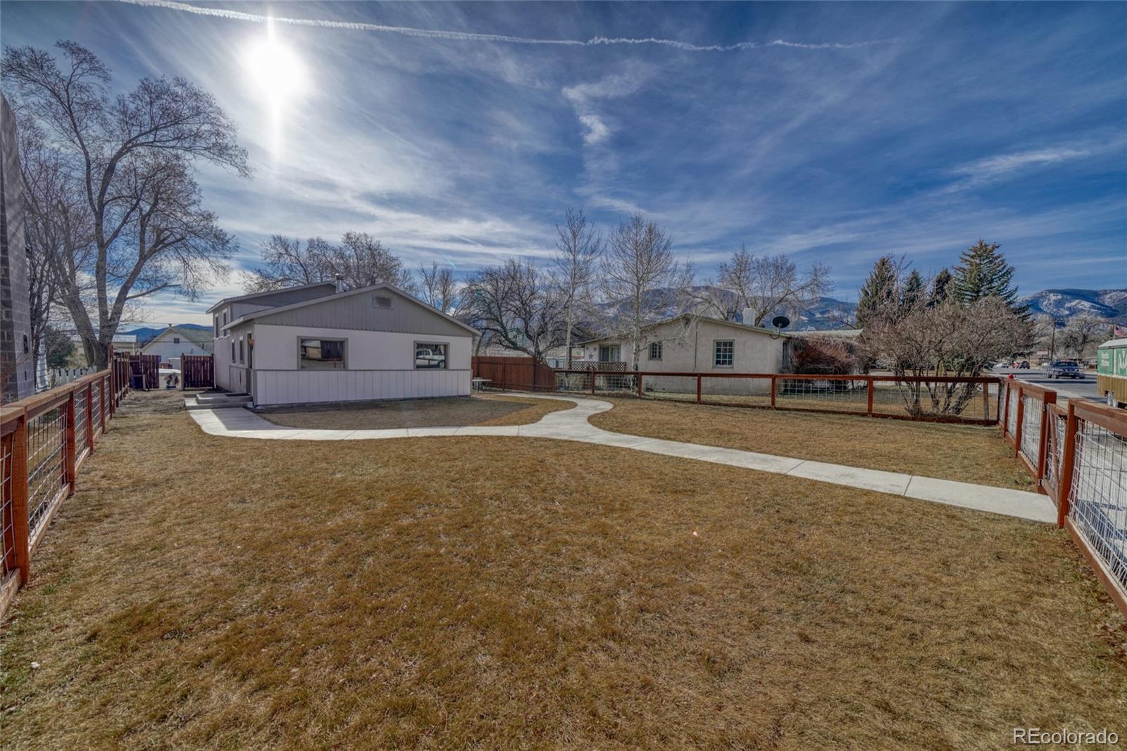 1335 F Street Salida, CO 81201 - Photo 4 of 44 a view of a house with a yard