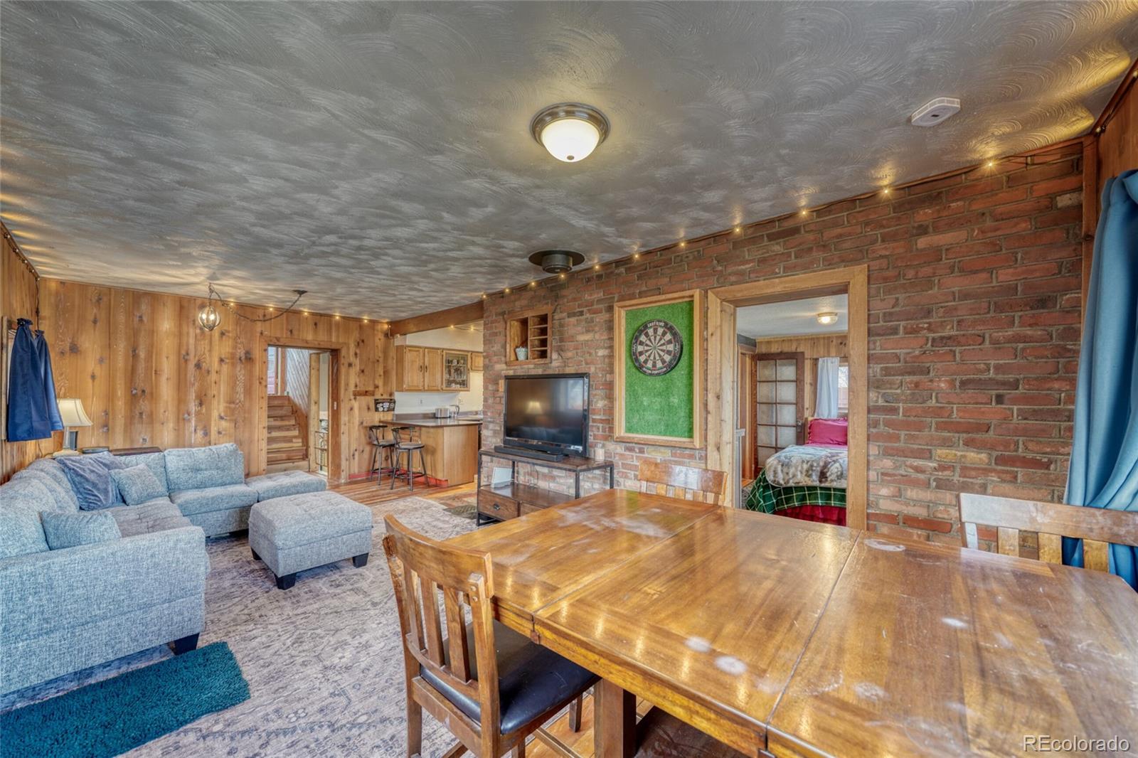 1335 F Street Salida, CO 81201 - Photo 7 of 44 a living room with furniture and a large window