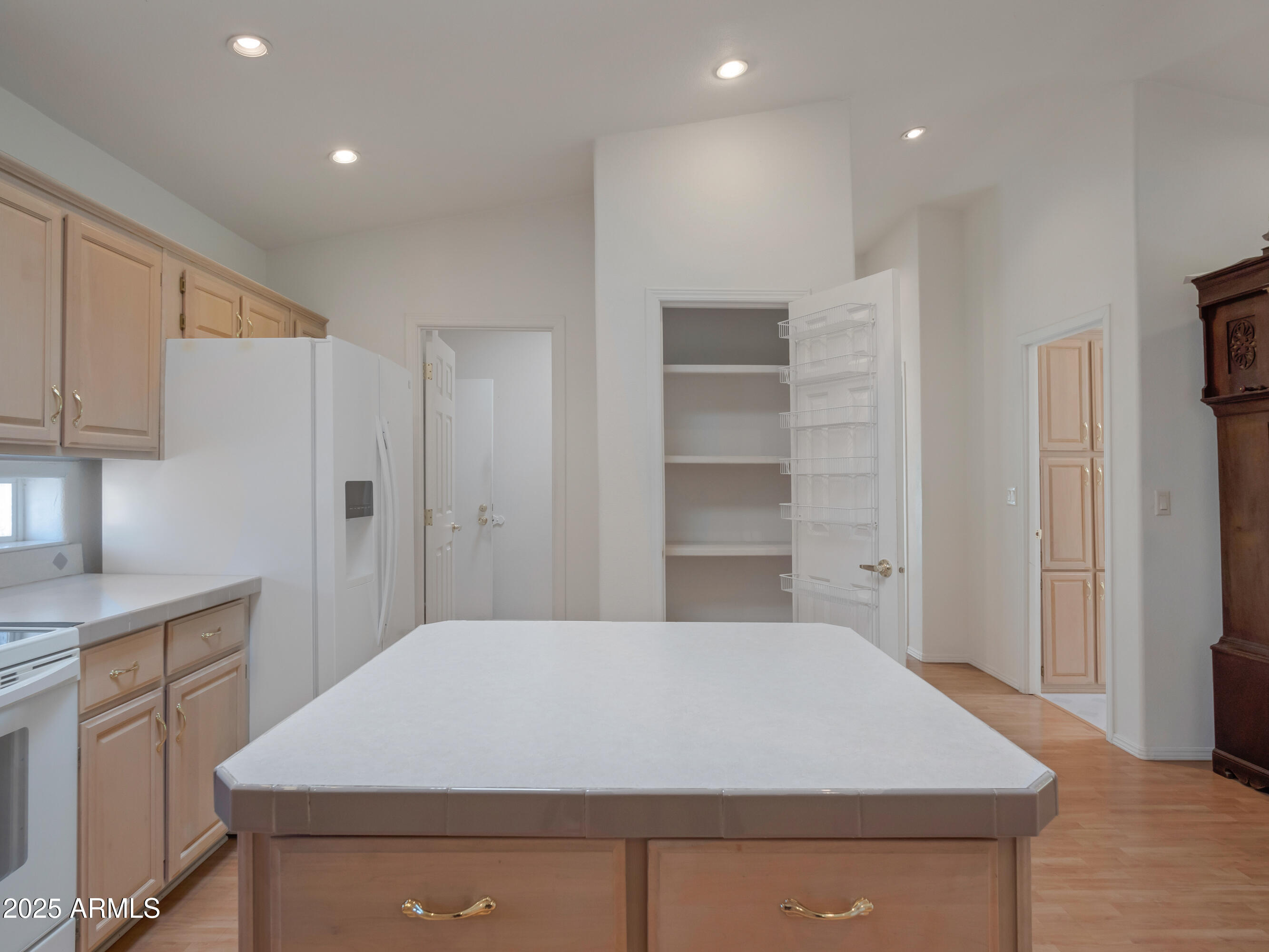 2050 West State Rte 89A, Unit 344 Sedona, AZ 86336 - Photo 23 of 35 a large kitchen with kitchen island a sink stainless steel appliances and cabinets
