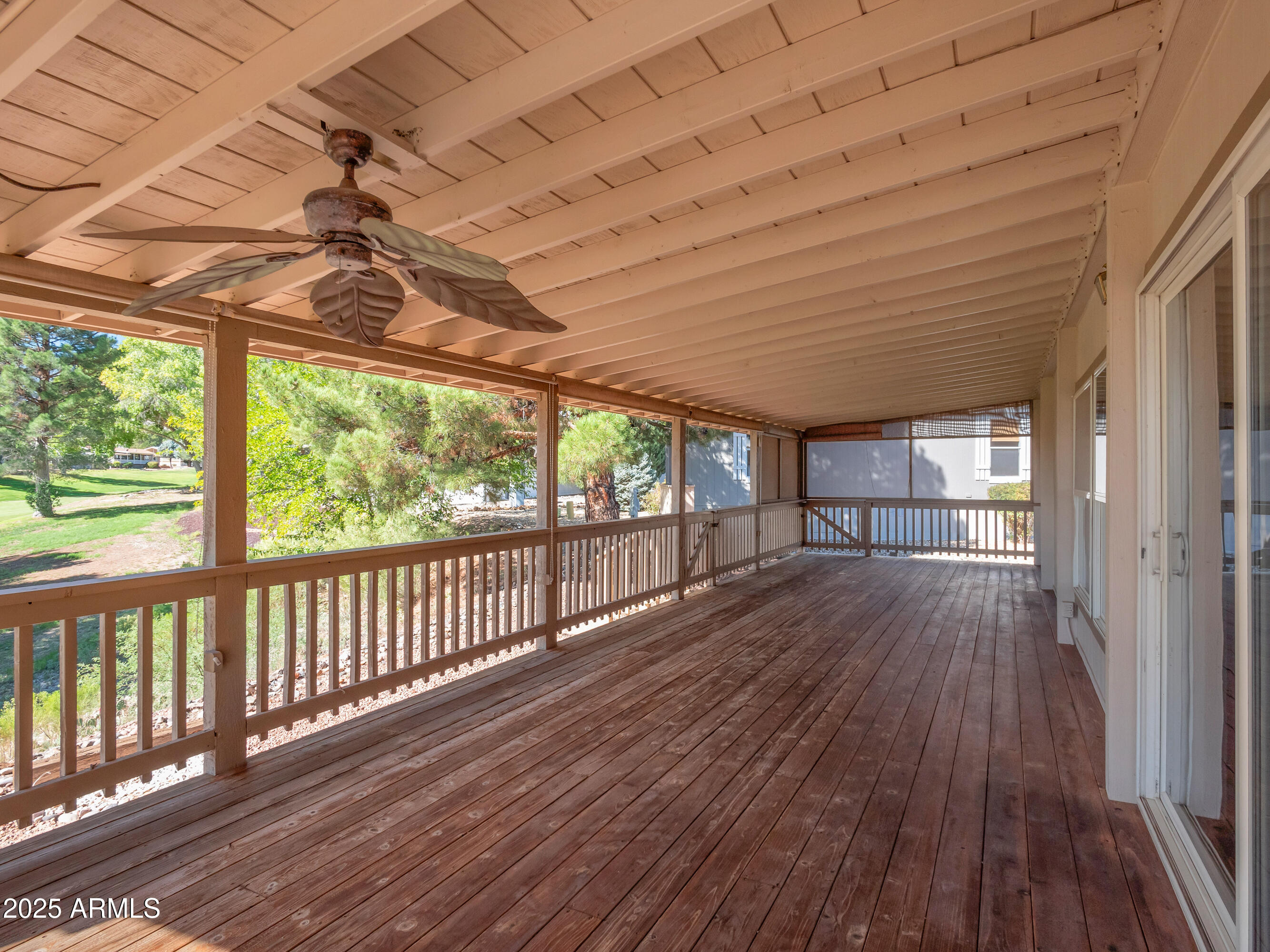 2050 West State Rte 89A, Unit 344 Sedona, AZ 86336 - Photo 26 of 35 a view of porch with wooden floor