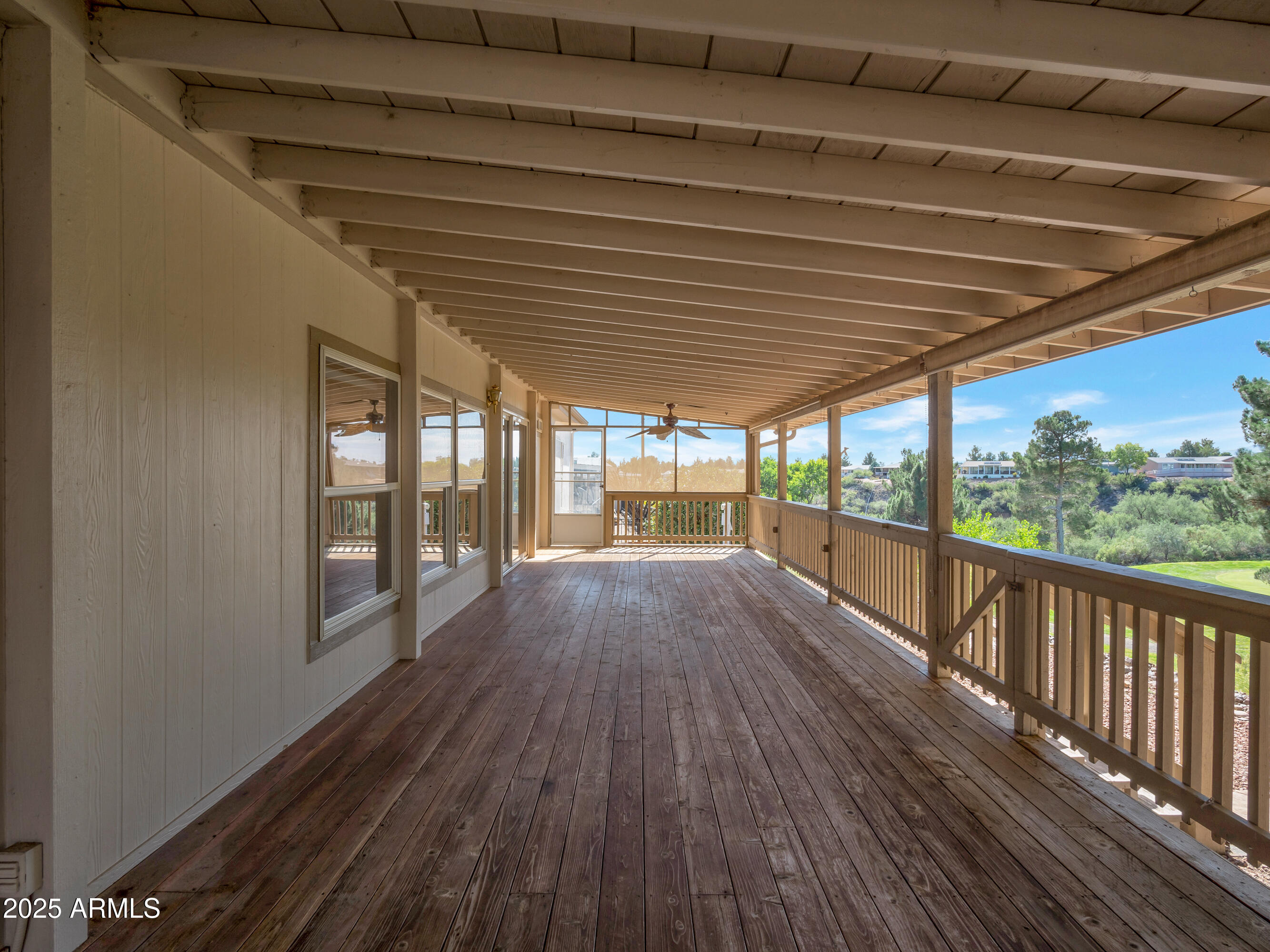 2050 West State Rte 89A, Unit 344 Sedona, AZ 86336 - Photo 27 of 35 a view of a porch with wooden floor and outdoor space