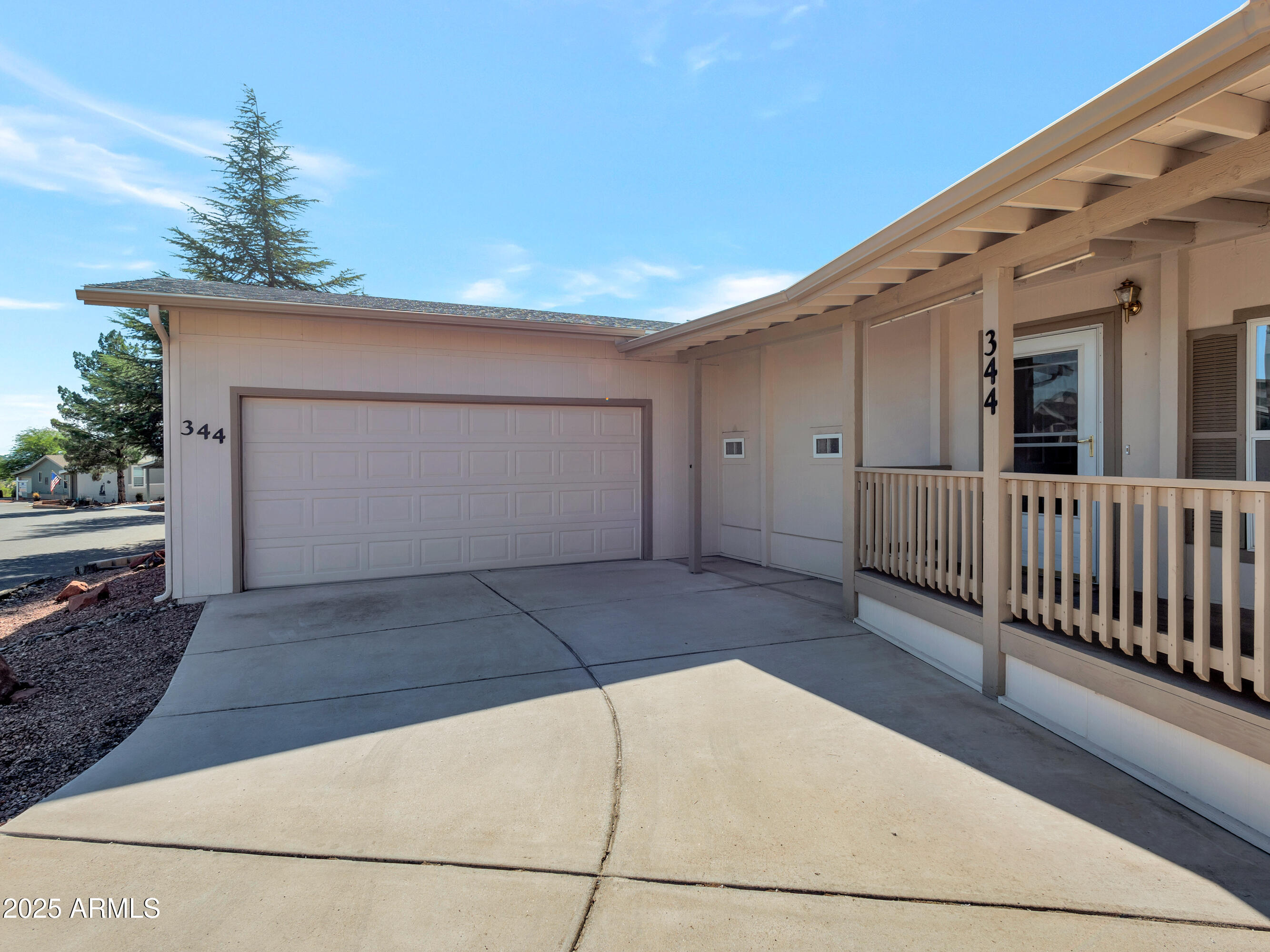 2050 West State Rte 89A, Unit 344 Sedona, AZ 86336 - Photo 32 of 35 a view of a house with a garage