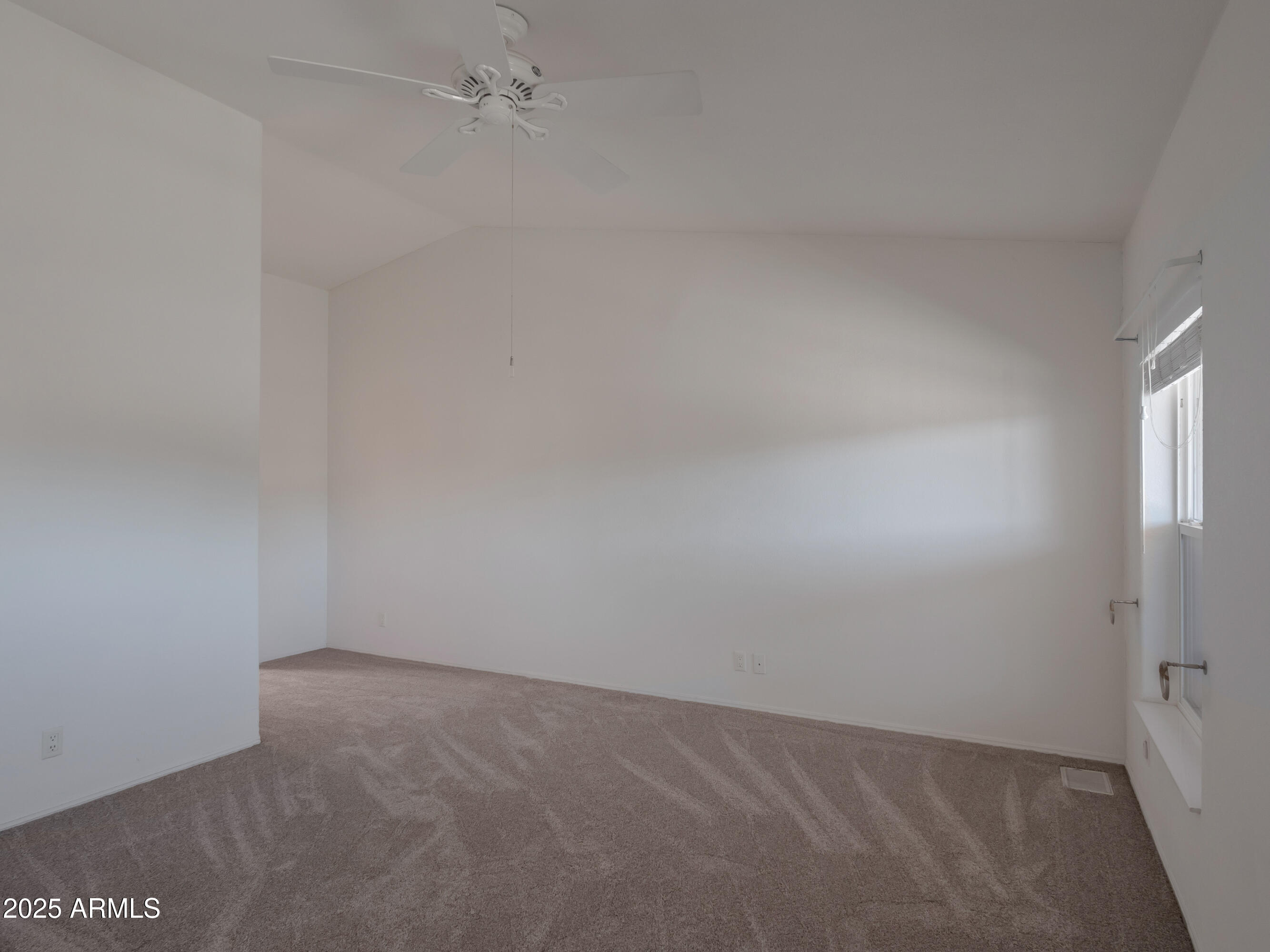 2050 West State Rte 89A, Unit 344 Sedona, AZ 86336 - Photo 9 of 35 an empty room with a empty space and window