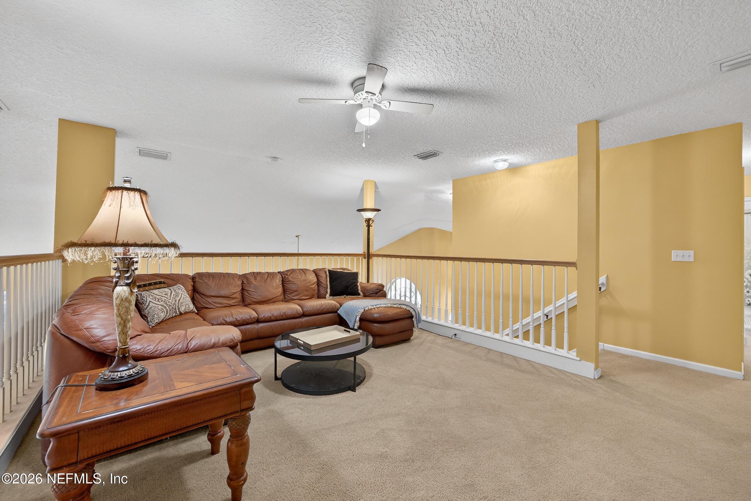 588 Reflection Cove Road Jacksonville, FL 32218 - Photo 26 of 53 a living room with furniture