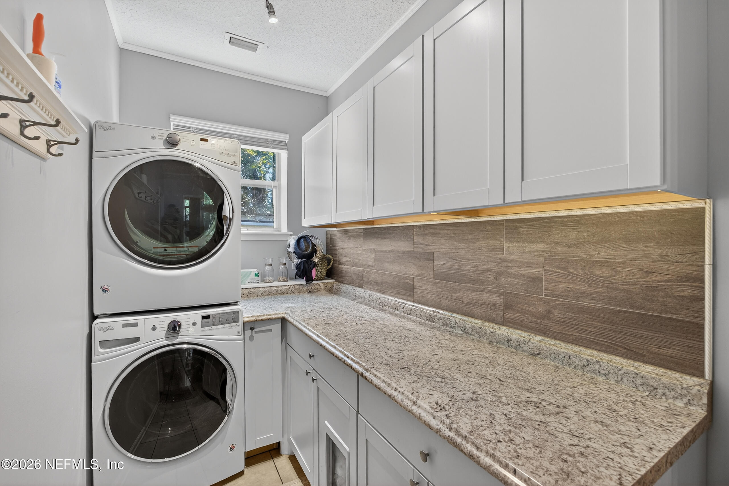 588 Reflection Cove Road Jacksonville, FL 32218 - Photo 38 of 53 a utility room with sink dryer and washer