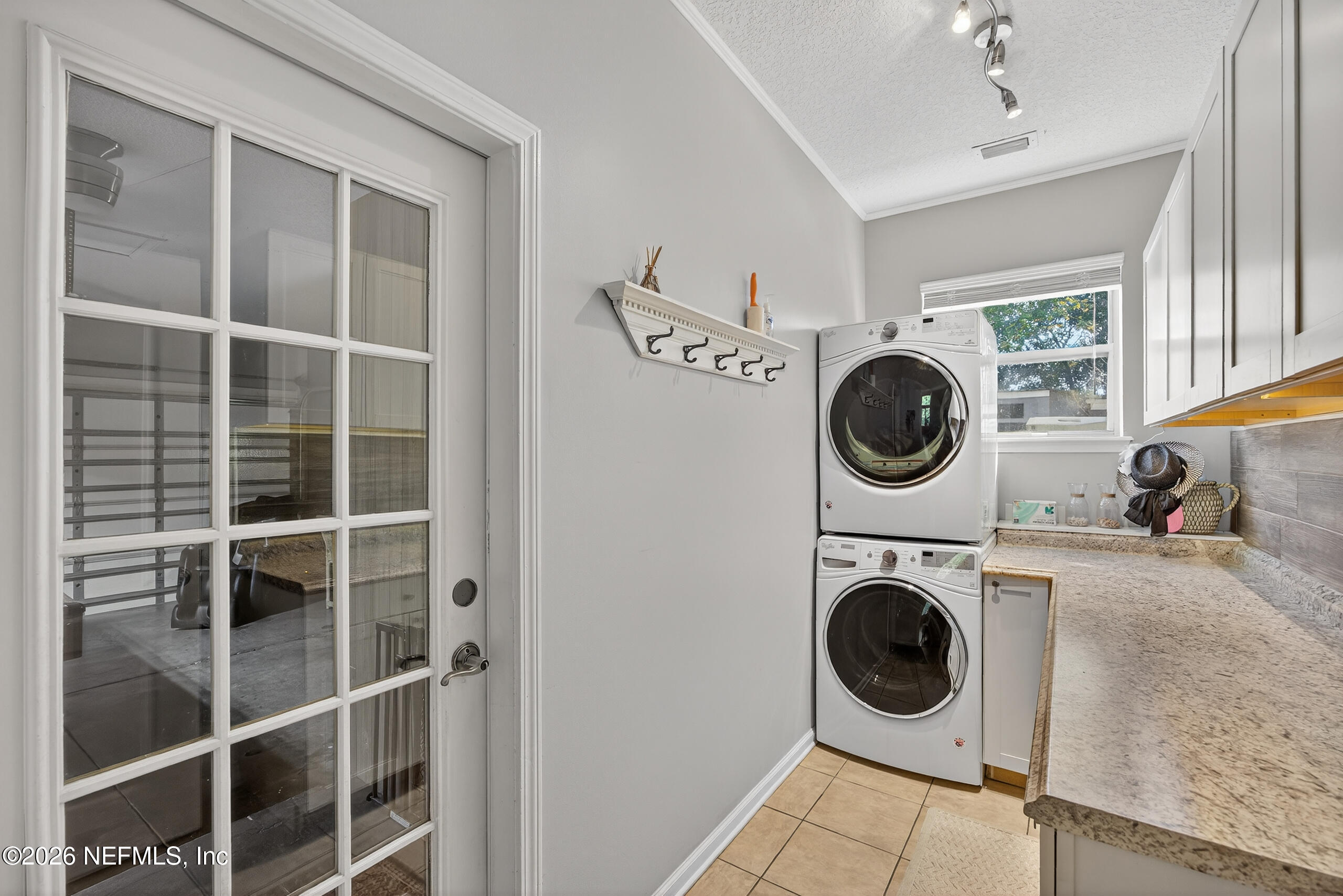 588 Reflection Cove Road Jacksonville, FL 32218 - Photo 39 of 53 a view of livingroom with washer and dryer