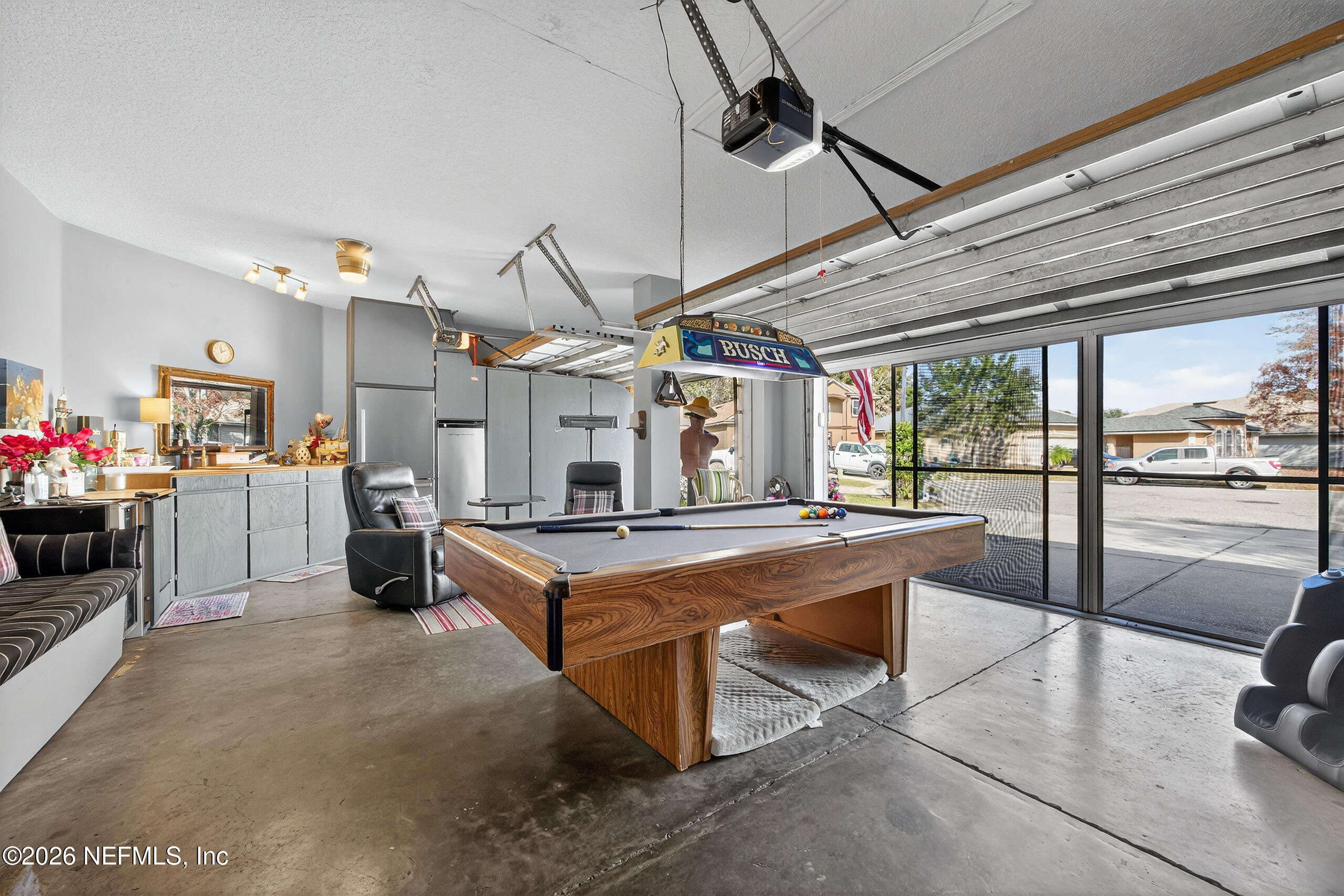 588 Reflection Cove Road Jacksonville, FL 32218 - Photo 41 of 53 a room with stainless steel appliances kitchen island granite countertop lots of counter top space