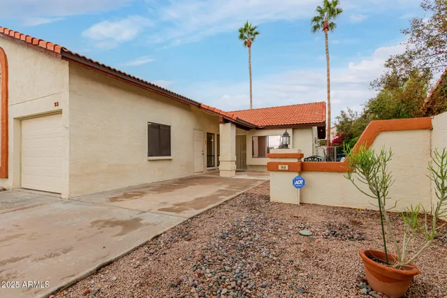 a view of a street with houses