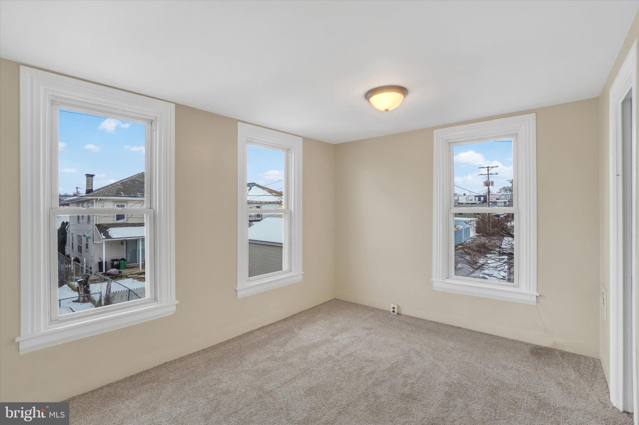 923 East Princess Street York, PA 17403 - Photo 13 of 24 a view of an empty room with a window
