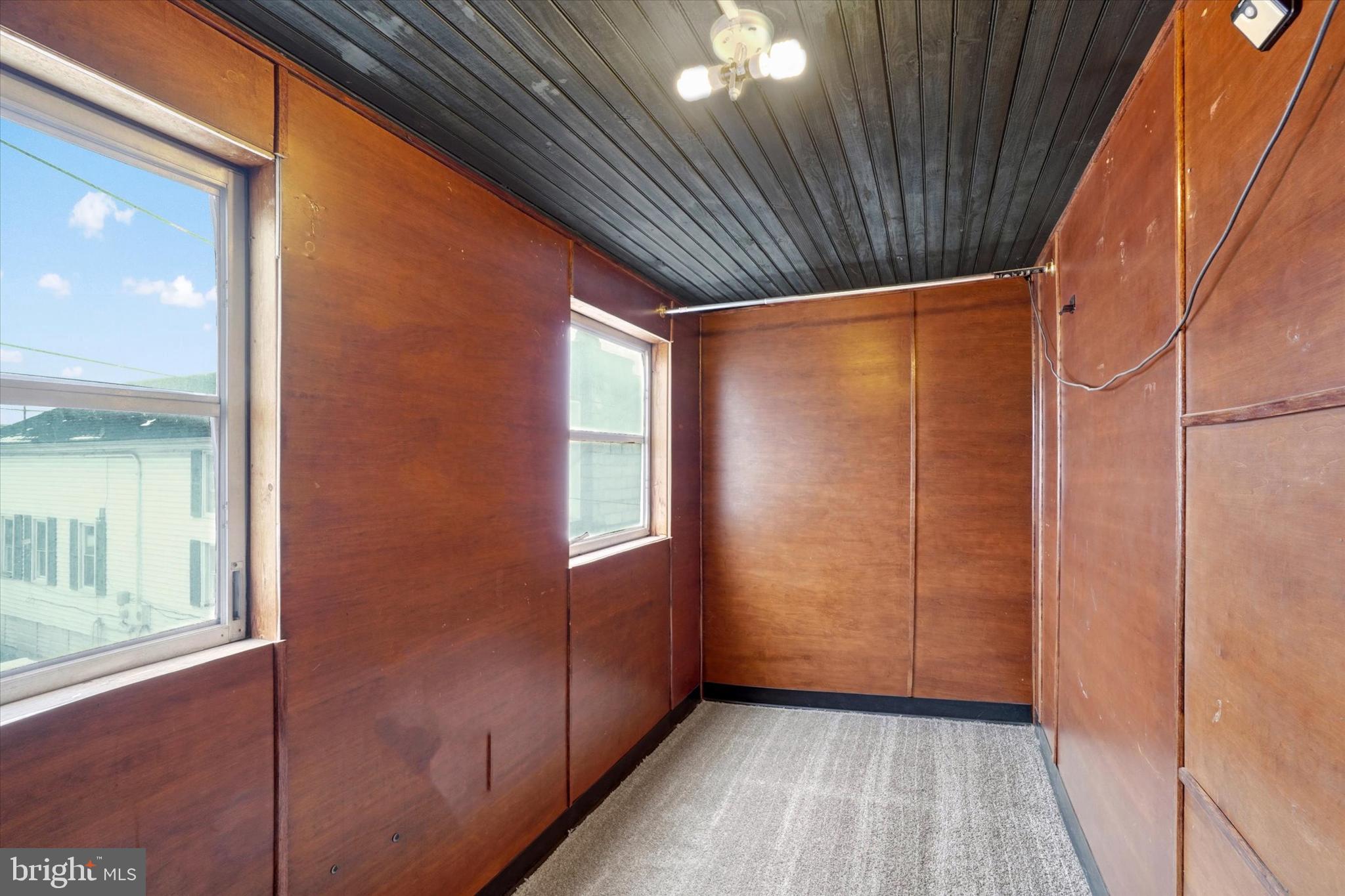 923 East Princess Street York, PA 17403 - Photo 18 of 24 a view of an empty room with wooden floor and a window