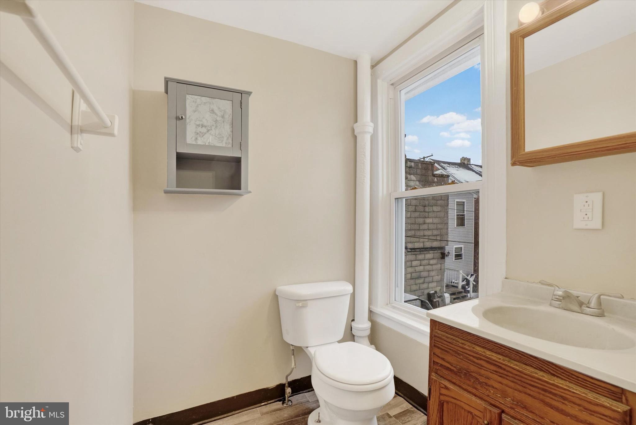 923 East Princess Street York, PA 17403 - Photo 20 of 24 a bathroom with a toilet a sink and a shower