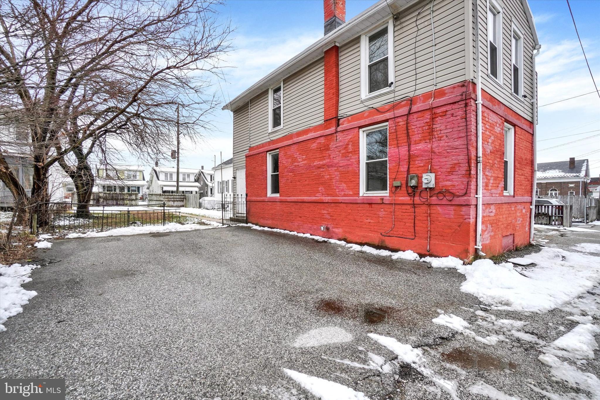 923 East Princess Street York, PA 17403 - Photo 2 of 24 a front view of a building with a road