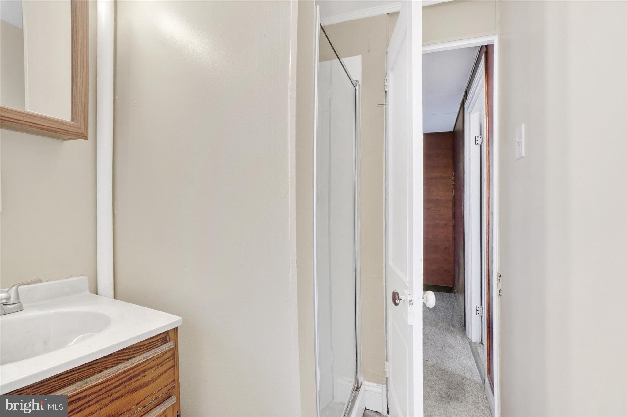 923 East Princess Street York, PA 17403 - Photo 21 of 24 a bathroom with a sink and a mirror