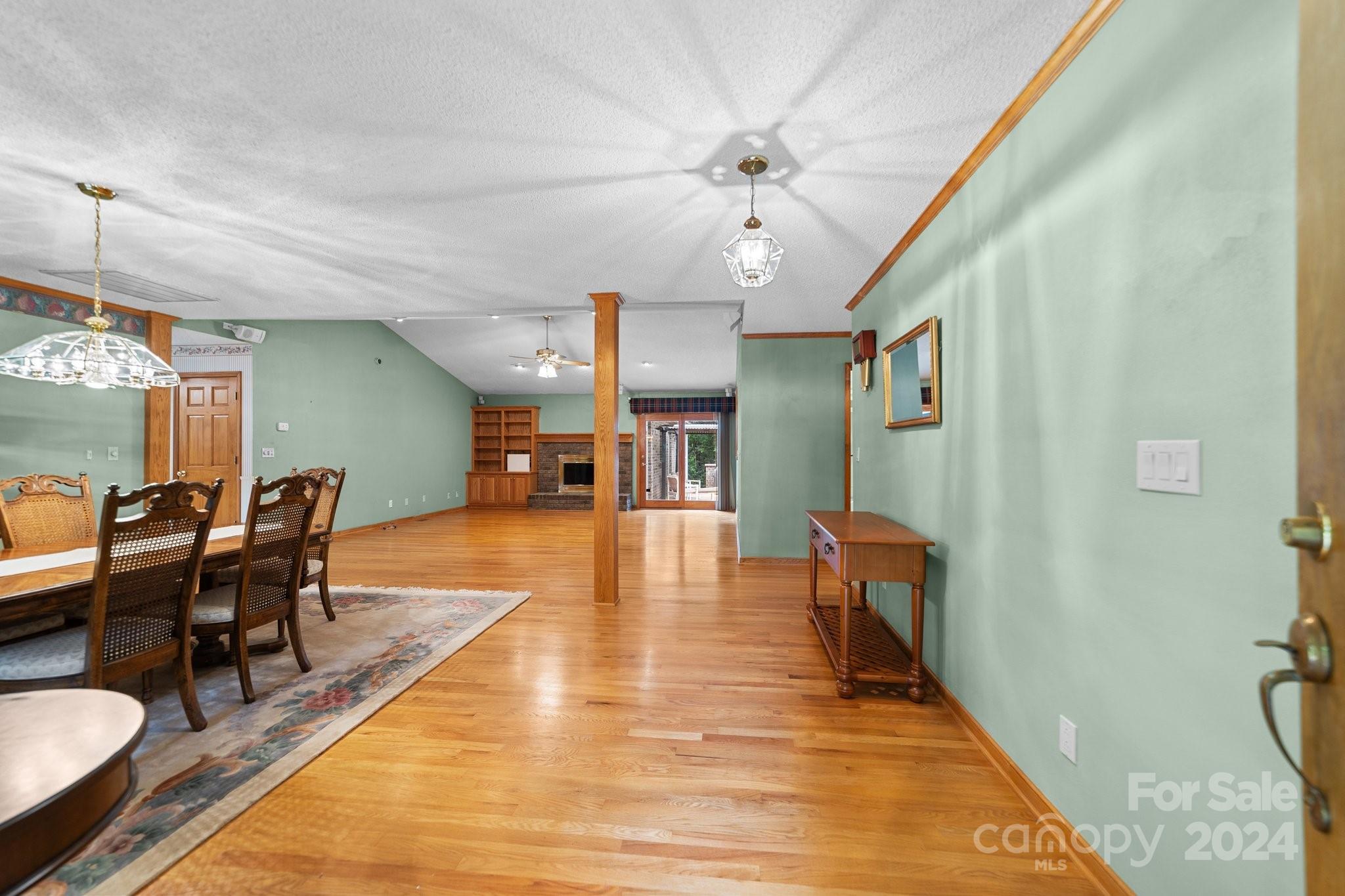 1808 Thompson Drive Concord, NC 28025 - Photo 11 of 48 a view of a dining room with furniture and wooden floor