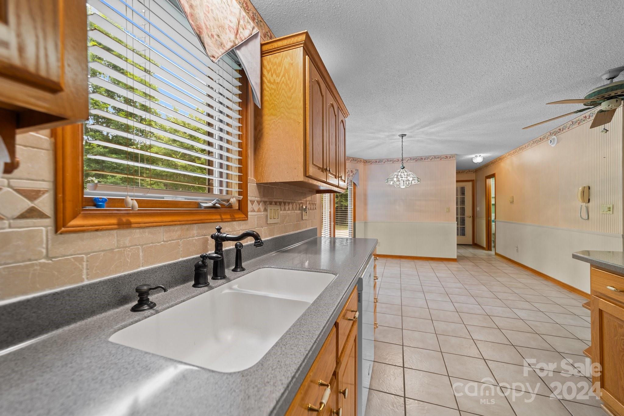 1808 Thompson Drive Concord, NC 28025 - Photo 22 of 48 a bathroom with a sink and a mirror