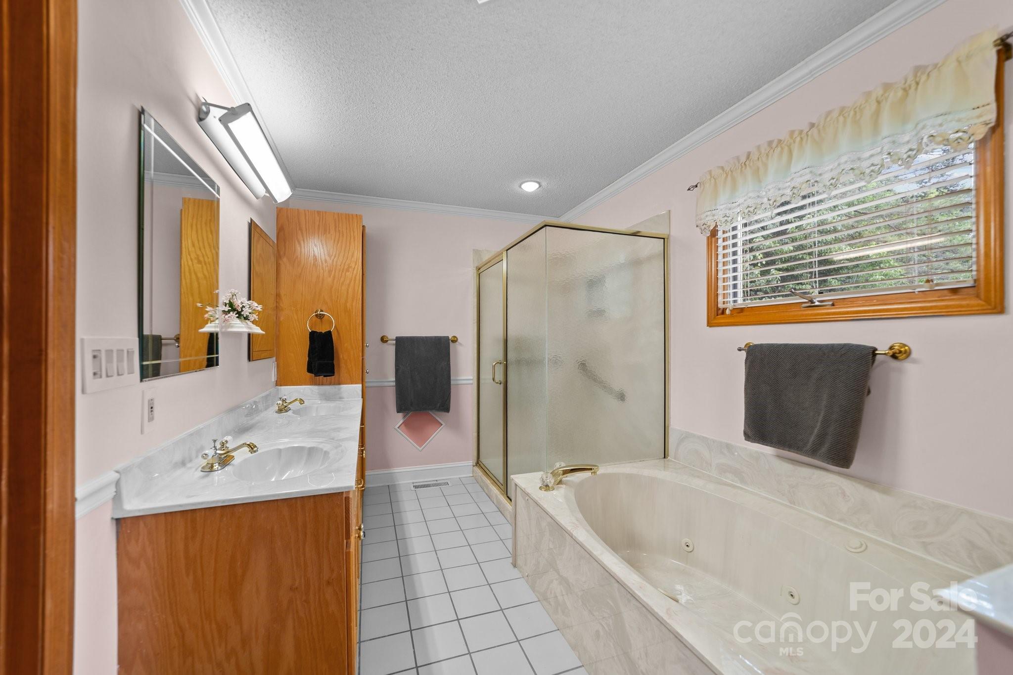 1808 Thompson Drive Concord, NC 28025 - Photo 25 of 48 a bathroom with a bathtub and a sink
