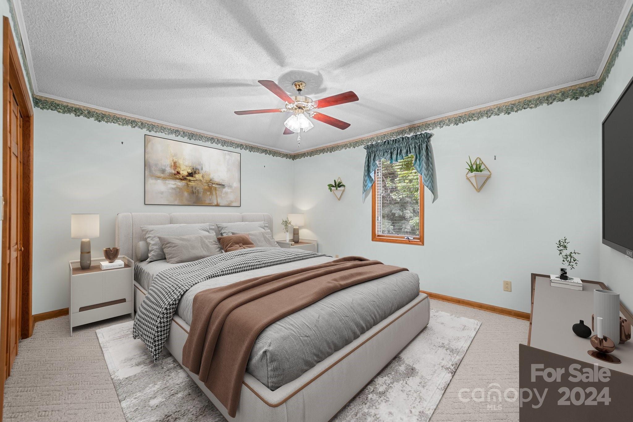 1808 Thompson Drive Concord, NC 28025 - Photo 30 of 48 a bedroom with a large bed and a chandelier