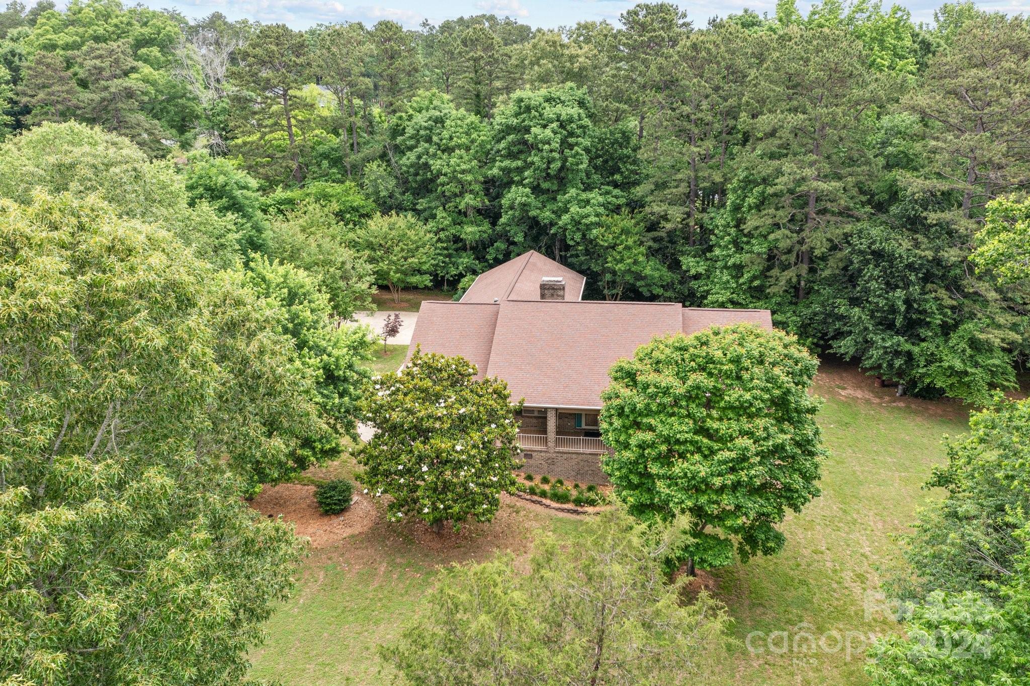 1808 Thompson Drive Concord, NC 28025 - Photo 46 of 48 an aerial view of a house with a yard and lake view