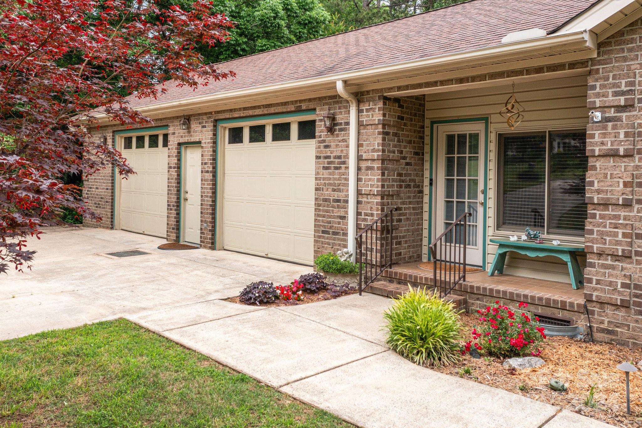1808 Thompson Drive Concord, NC 28025 - Photo 5 of 48 a front view of a house with garden