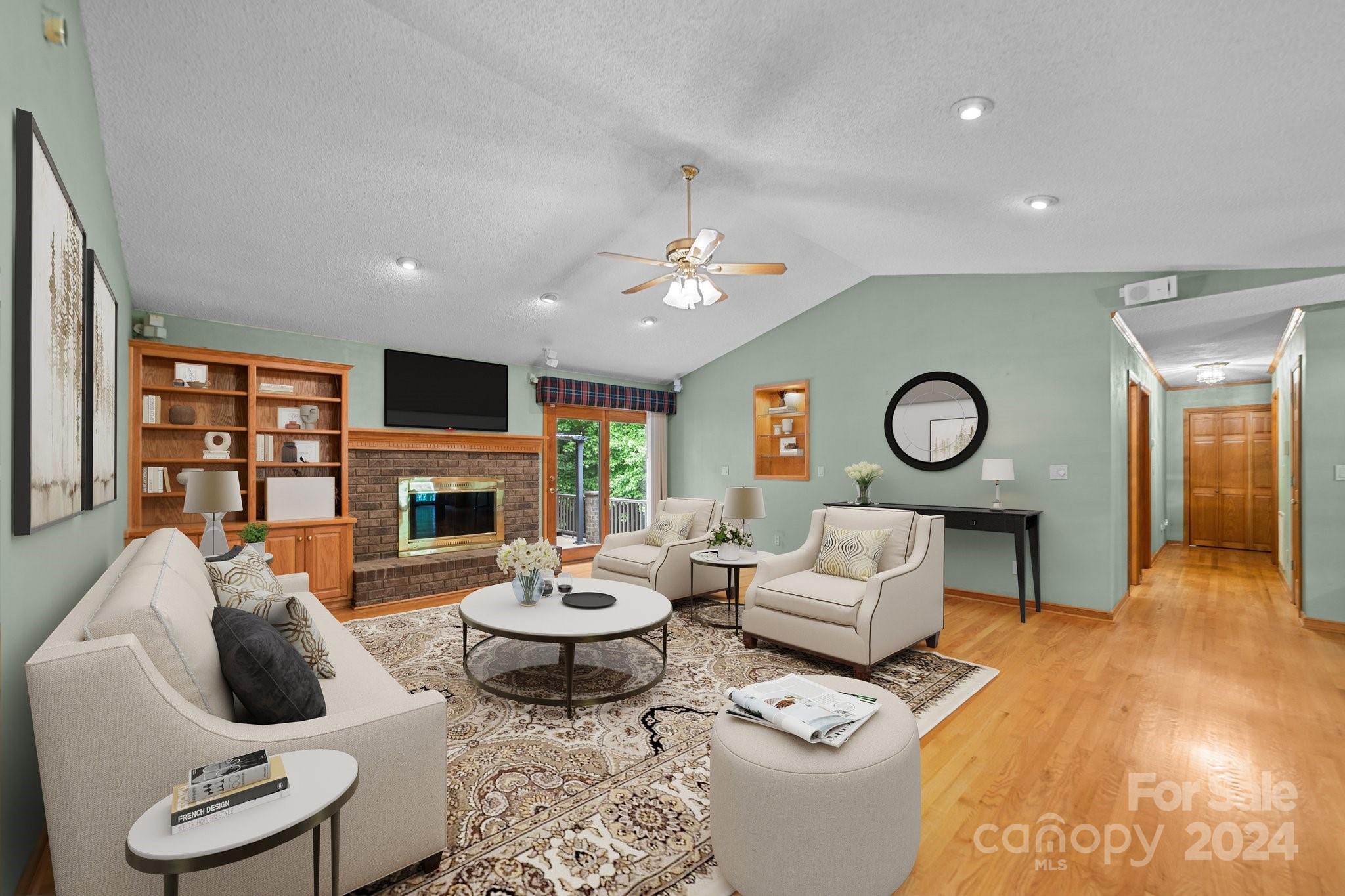 1808 Thompson Drive Concord, NC 28025 - Photo 8 of 48 a living room with fireplace furniture and a flat screen tv