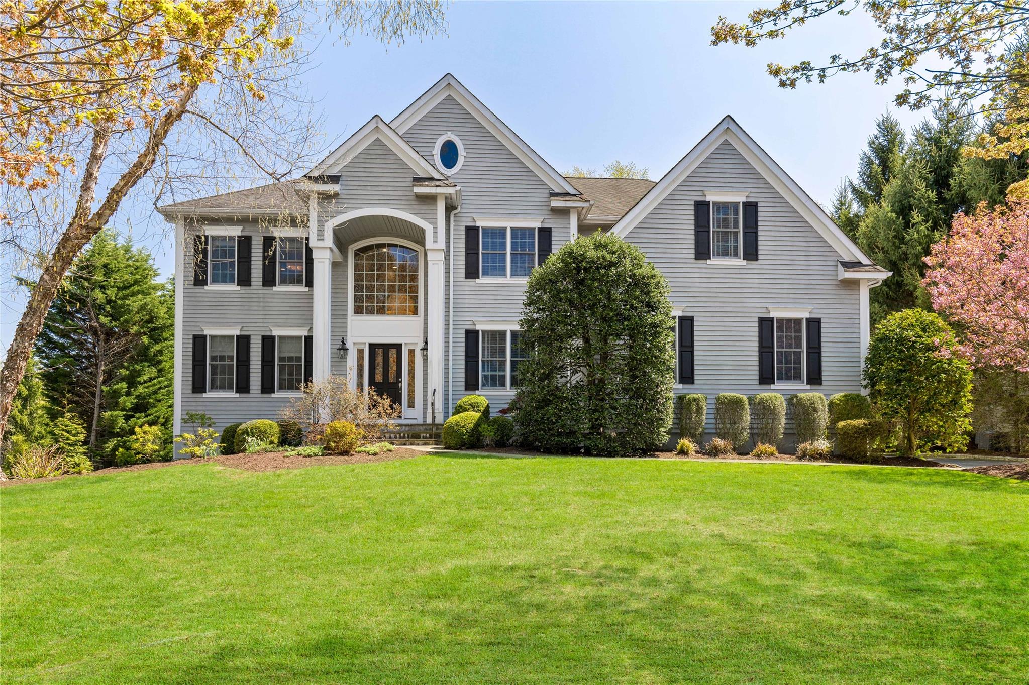 35 Stonewall Circle West Harrison, NY 10604 - Photo 1 of 1 View of front facade featuring a front lawn