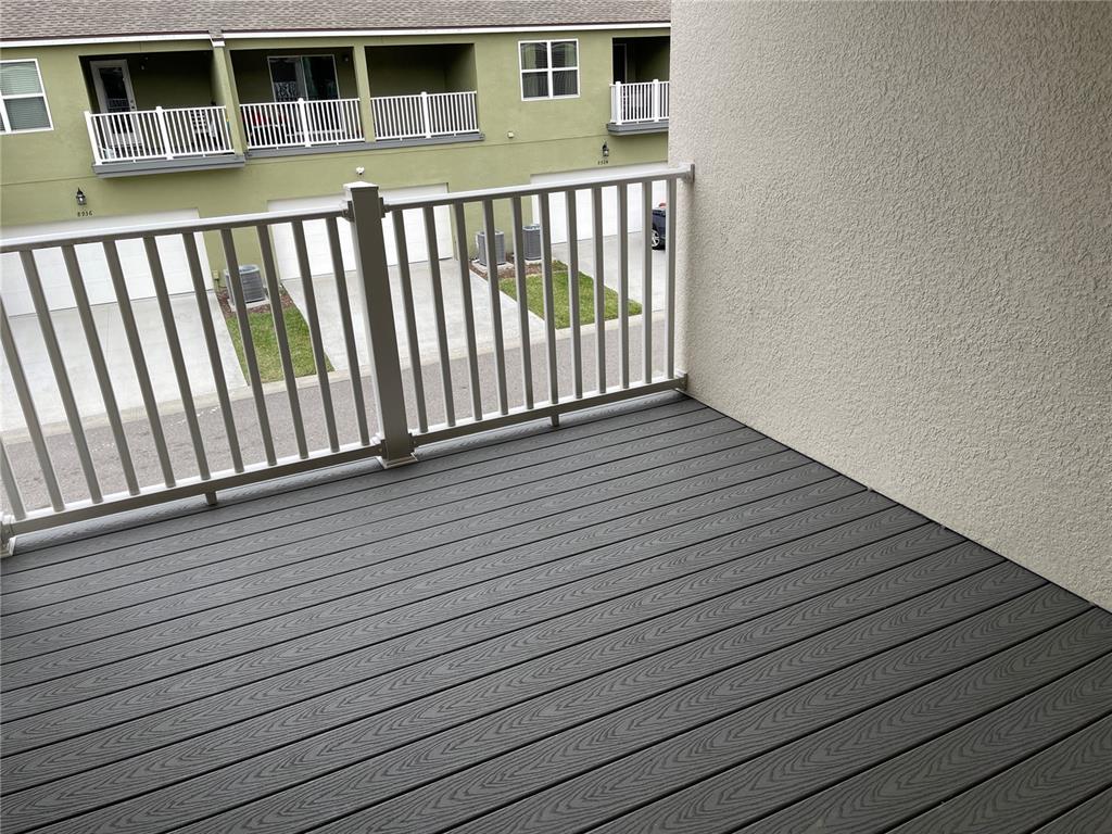 8937 Matriarca Alley Windermere, FL 34786 - Photo 16 of 17 a view of wooden balcony
