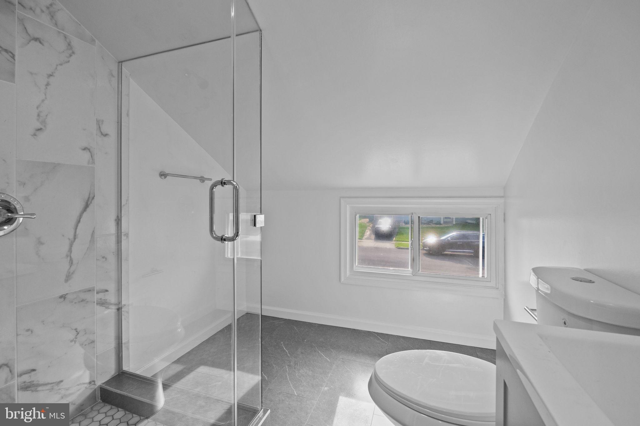 28 Gooseneck Road Levittown, PA 19057 - Photo 19 of 23 a bathroom with a toilet and a shower