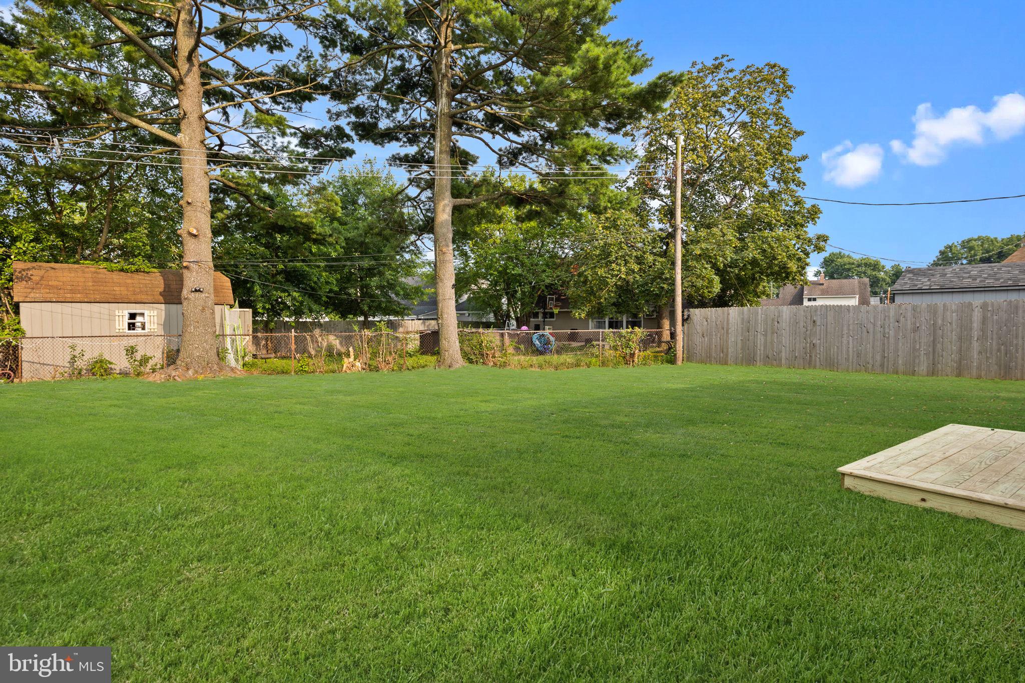 28 Gooseneck Road Levittown, PA 19057 - Photo 21 of 23 a view of a park with large trees
