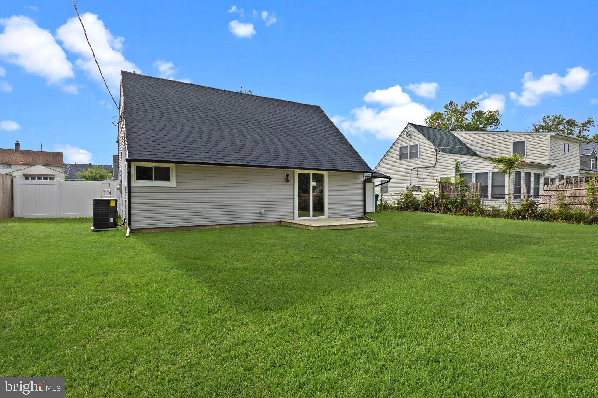 28 Gooseneck Road Levittown, PA 19057 - Photo 23 of 23 a front view of house with yard and green space