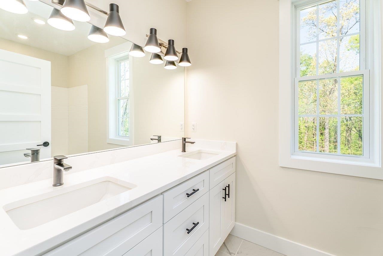 1378 Melrose Road Harrisonburg, VA 22802 - Photo 35 of 75 a bathroom with a sink and a mirror