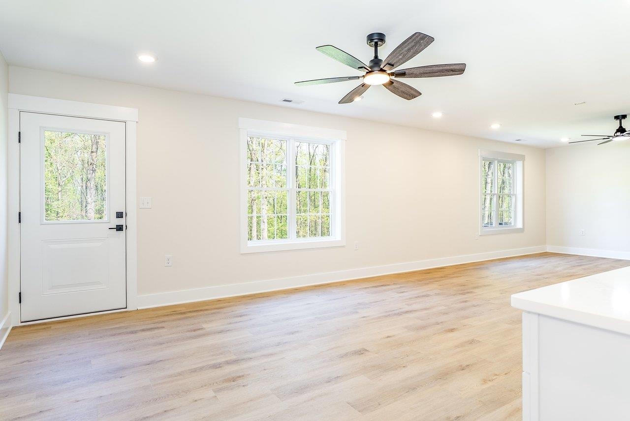 1378 Melrose Road Harrisonburg, VA 22802 - Photo 45 of 75 an empty room with wooden floor fan and windows