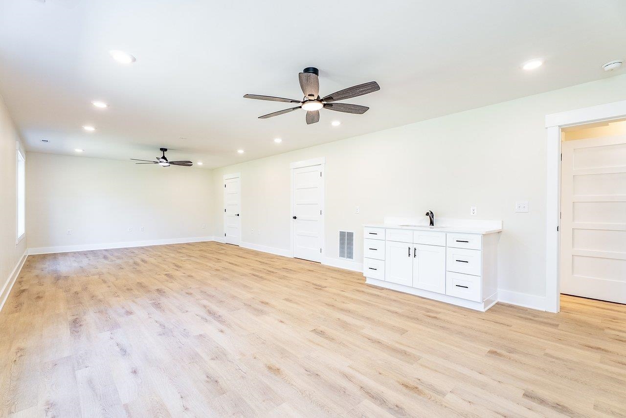 1378 Melrose Road Harrisonburg, VA 22802 - Photo 47 of 75 a view of a kitchen with sink cabinets and wooden floor