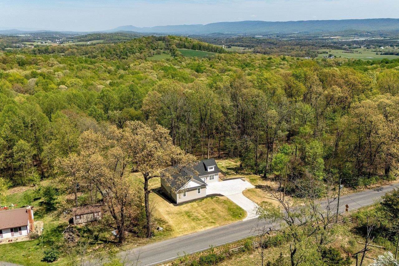 1378 Melrose Road Harrisonburg, VA 22802 - Photo 8 of 75 a view of a lake with a mountain