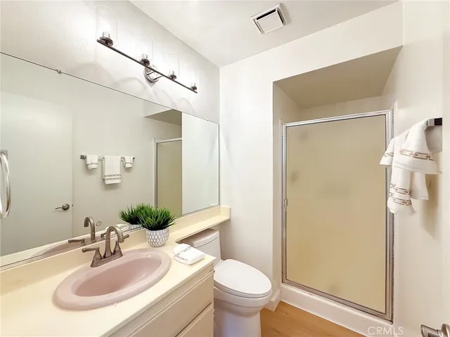 a view of a swimming pool with an outdoor space and seating area