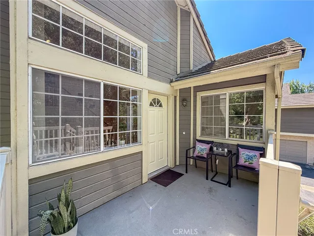 a view of a yard with palm trees