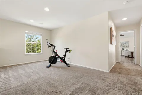 a view of room with gym equipment