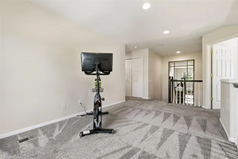 a view of a livingroom with a flat screen tv