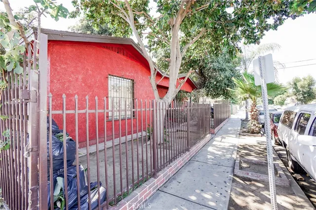 a front view of a house with parking