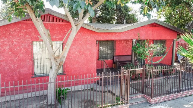 a front view of a house with glass windows