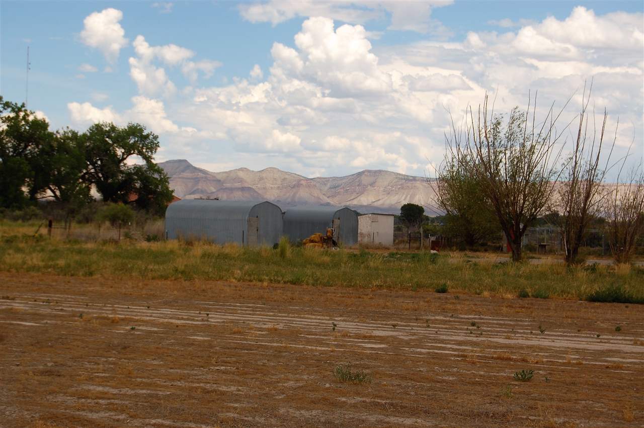 2204 H Road Grand Junction, CO 81505 - Photo 16 of 21 a view of a town with mountains in the background