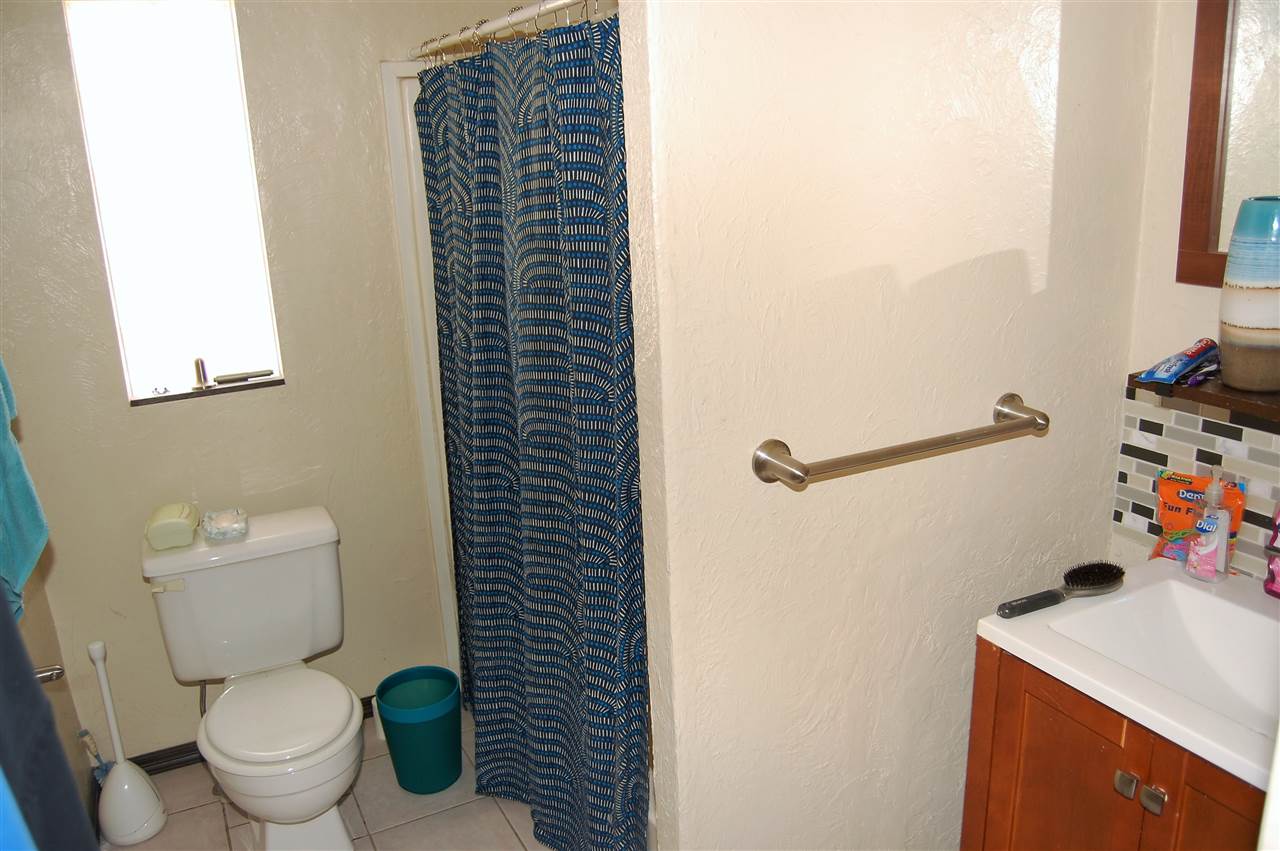 2204 H Road Grand Junction, CO 81505 - Photo 7 of 21 a bathroom with a toilet and a sink
