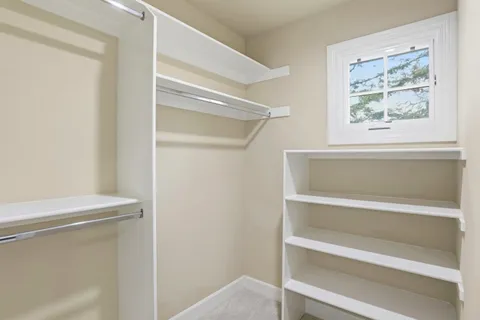 a view of small space with racks on the wall
