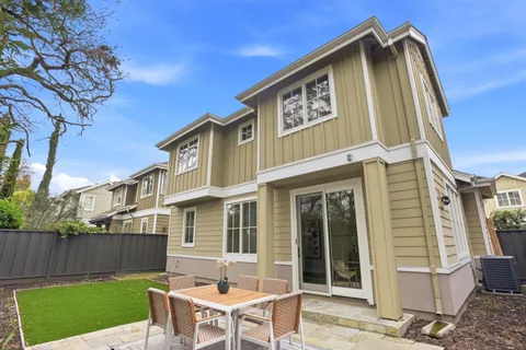 a front view of a house having yard