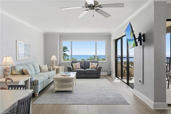 a living room with furniture and a window