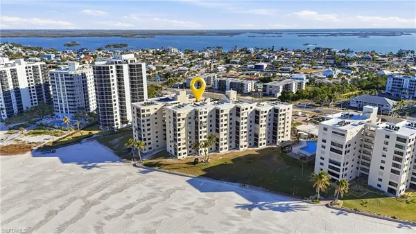 a view of a balcony with furniture