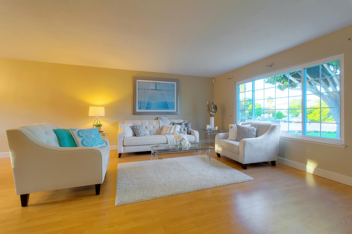 664 New Compton Drive San Jose, CA 95136 - Photo 12 of 26 a living room with furniture and a large window